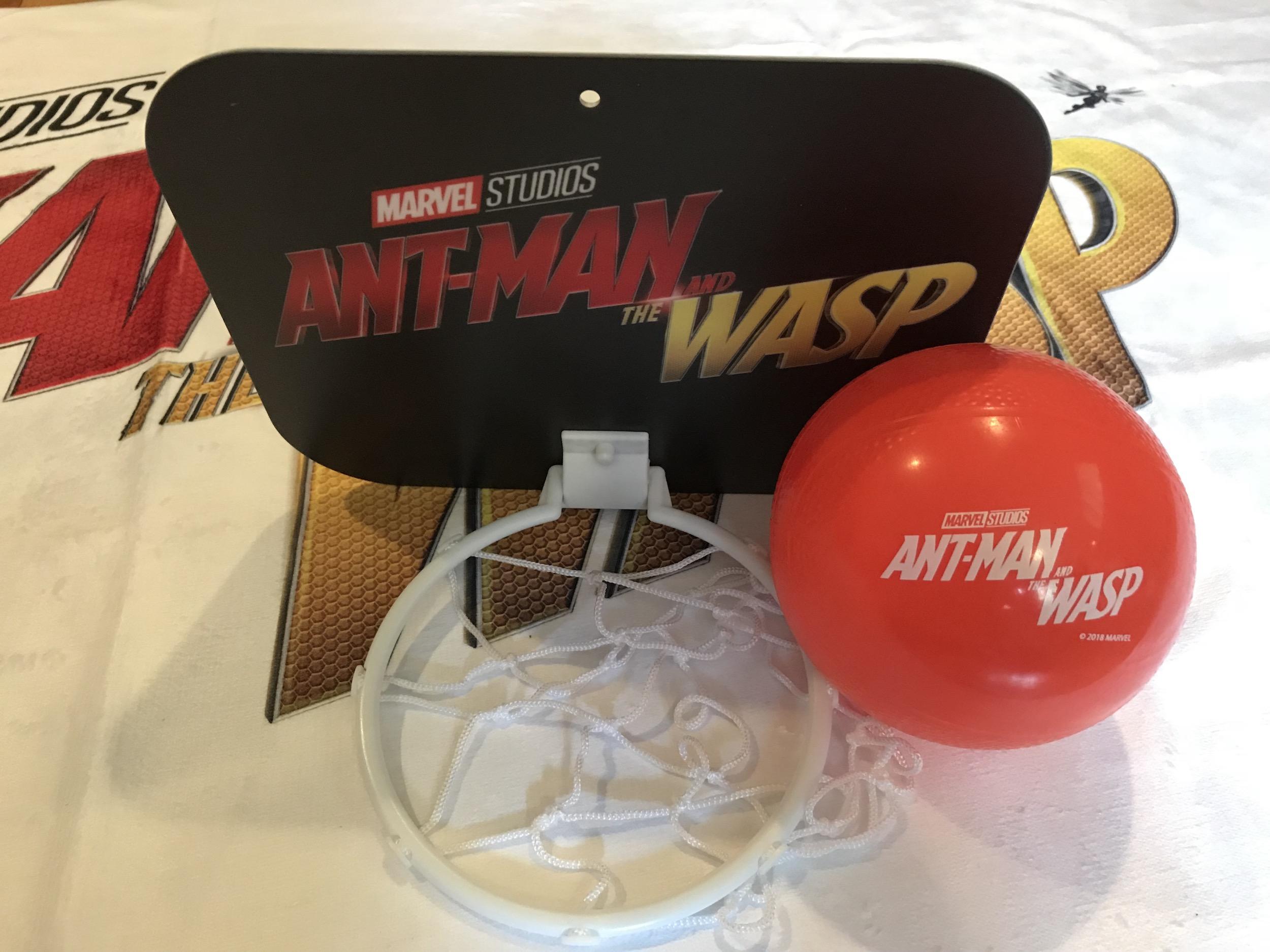  I loved Ant-Man. Such a hugely emotional story packed into a teeny tiny character. So when Ant-Man and the Wasp came out, I was blown away at twice the action, twice the teeny tiny superheroes and twice the shockers!  If you haven't seen Ant-Man and the Wasp yet... shut the door! No, really. Go shut the door then sit on your couch and start streaming it because that bad boy is available now on digital download! And on October 16, you can take Ant-Man and the Wasp home as a super spiffy Blu-ray.  Without giving too much away, the film sees our hero Scott Lang stuck at home. Following the amazingly awesome events of Captain America: Civil War, our bugtastic hero found himself arrested. Thankfully, Scott Lang (Ant-Man) doesn't have to continue doing time on The Raft (a floating prison). Instead, he's stuck serving house arrest. On the plus side, he gets to spend some quality and creative time with his daughter Cassie.  Those folks over at Marvel thought it'd be fun for some of us bloggers to take on the role of Scott Lang and spend a Fun-At-Home Day In with our kids. Here's what they suggested: To help out, I was sent this crazy mystery box! What, pray tell, was inside it you may ask? Go ahead. Ask.  Yeeehah that's a lot of fun, cool Ant-Man and the Wasp loot! Specifically, we're talking about: Ant-Man and the Wasp Blu-ray Karaoke microphone (USB!) Deck of playing cards and a book of magic tricks Origami set Indoor bowling set Mini finger drum kit Indoor basketball hoop and basketball Bubble Bath set of a bath bomb and an Ant-Man and the Wasp towel #ANTMANANDTHEWASPBLURAY.